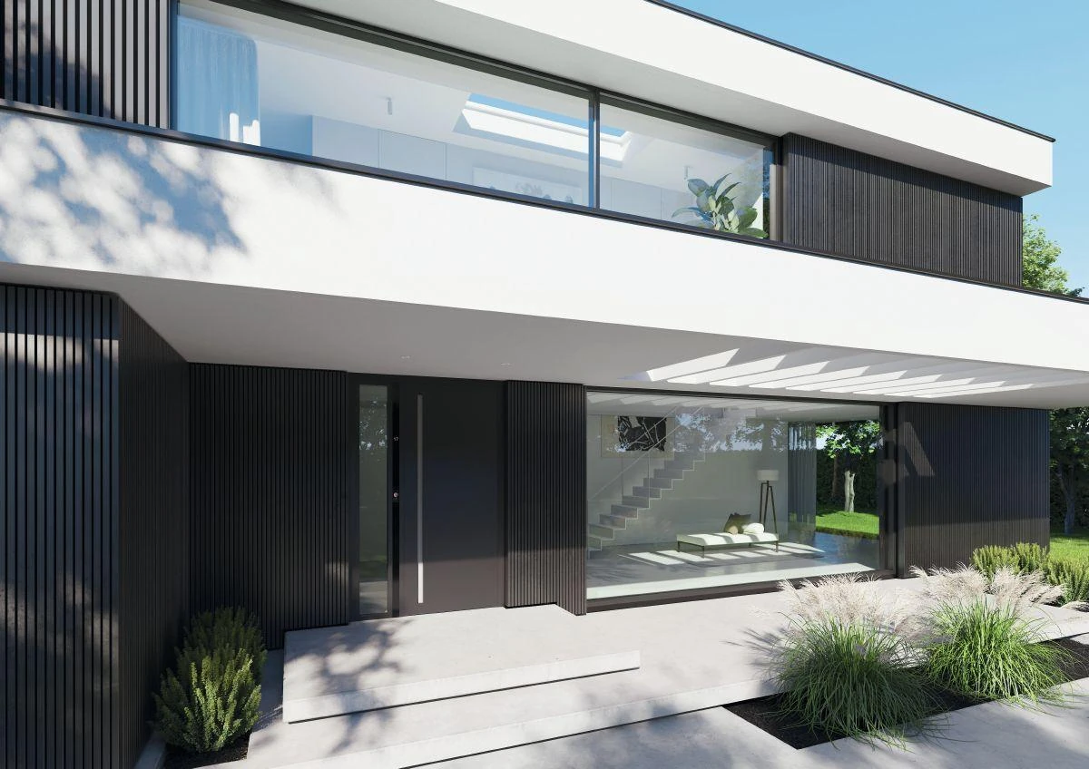 Moderne schwarze Aluminium-Haustür mit Seitenteil in einem zeitgemäßen Haus